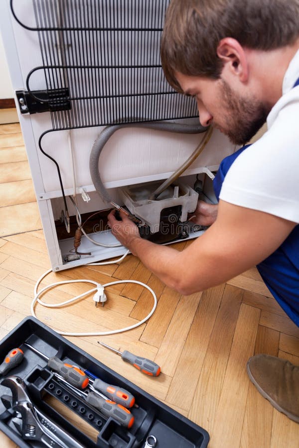 handyman repairs fridge broken 50198148